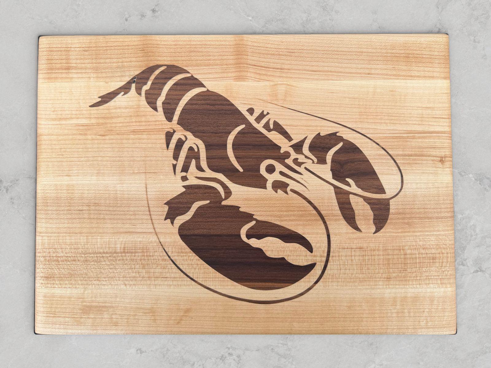 Edge-grain maple cutting board with a walnut inlay